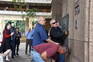 Central Services Division removing the plaque