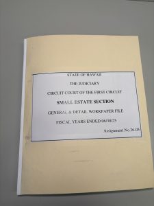 A yellow manila folder with a label saying "State of Hawaii - The Judiciary - Circuit Court of the First Circuit - Small Estate Section - General & Detail Workpaper File - Fiscal Years Ending 06/30/25 - Assignment No. 26-05"